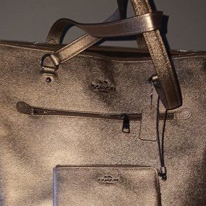 GOLD COACH PURSE